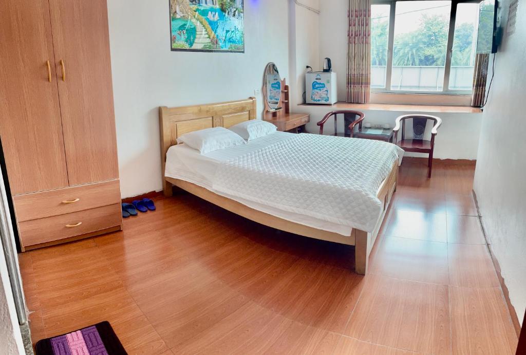 Postel nebo postele na pokoji v ubytování Van Anh Hotel