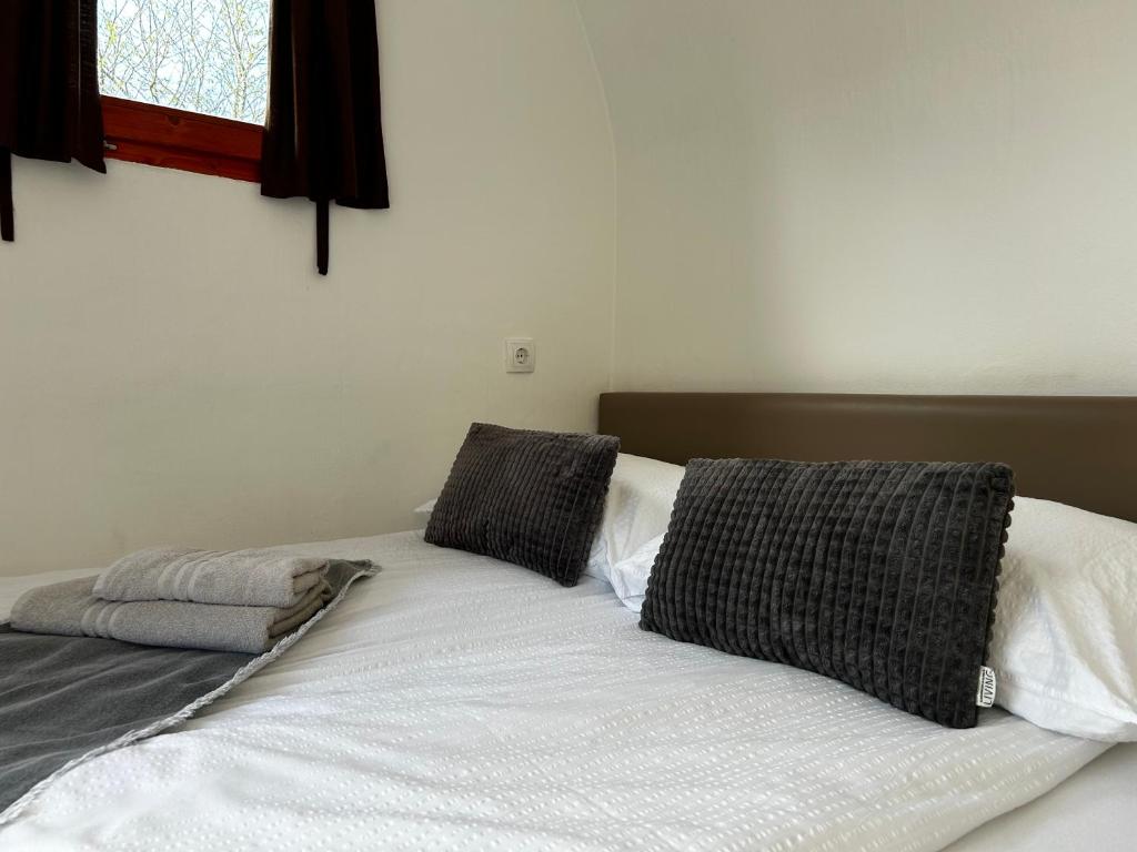 Ένα ή περισσότερα κρεβάτια σε δωμάτιο στο Glamping PEC - HALFBOARD