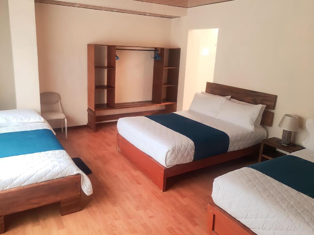 Postel nebo postele na pokoji v ubytování Casa Verde Descanso 1