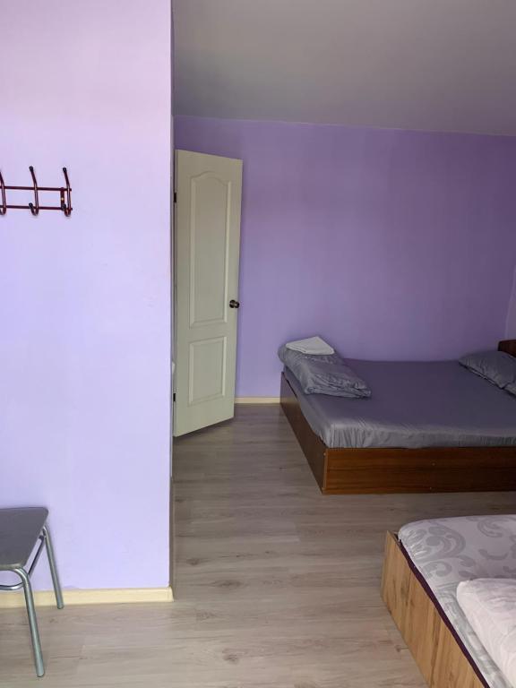 Postel nebo postele na pokoji v ubytování Гостиный Дом Comfort