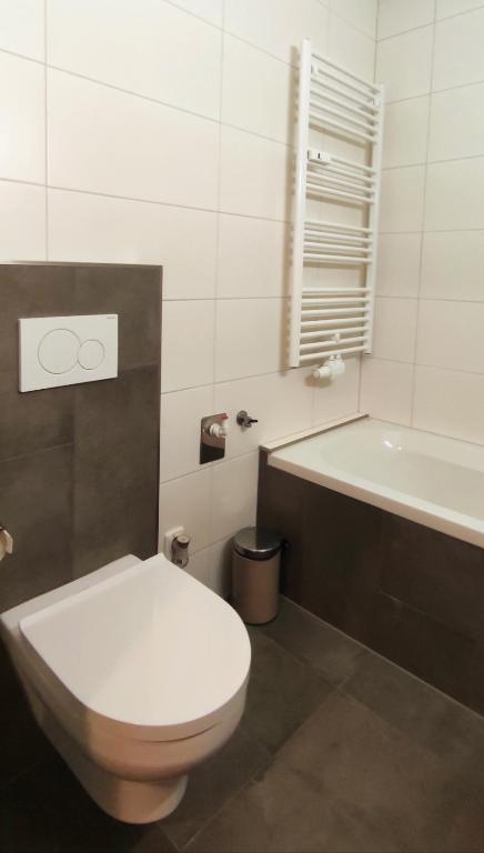 Kúpeľňa v ubytovaní Alpenappartements Domicil include Jokercard