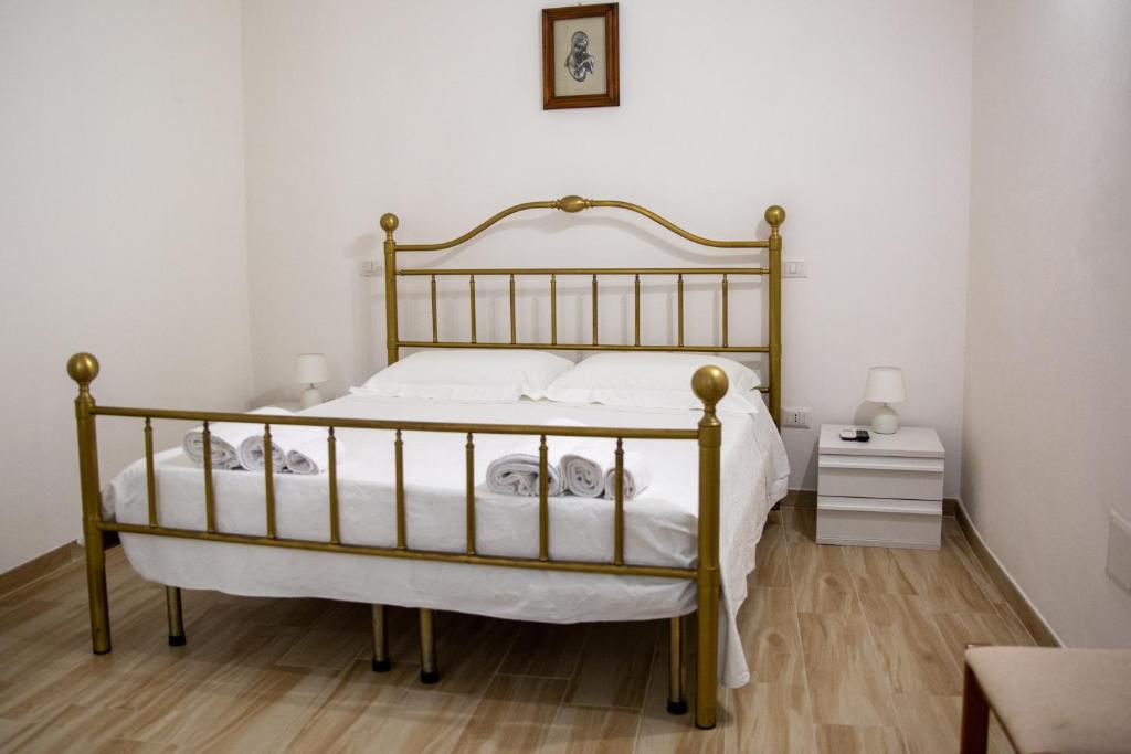 Ένα ή περισσότερα κρεβάτια σε δωμάτιο στο Da Zia Maria