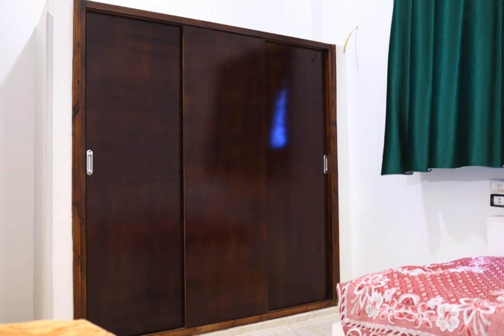 Postel nebo postele na pokoji v ubytování Magic Place Luxor