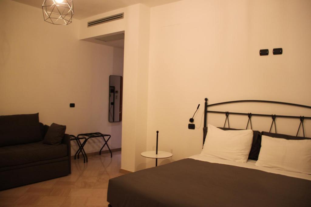Łóżko lub łóżka w pokoju w obiekcie B&B Le Terrazze Lama Balice