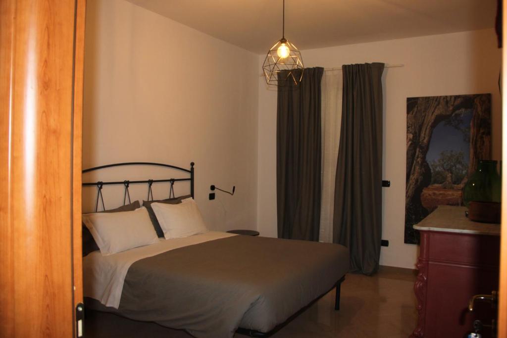 Łóżko lub łóżka w pokoju w obiekcie B&B Le Terrazze Lama Balice