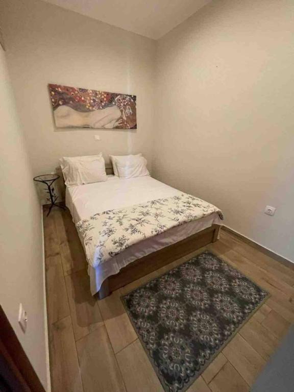 Postel nebo postele na pokoji v ubytování kalos house