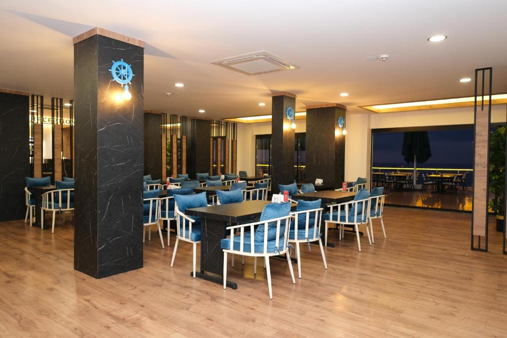 A restaurant or other place to eat at The Marine Hotel
