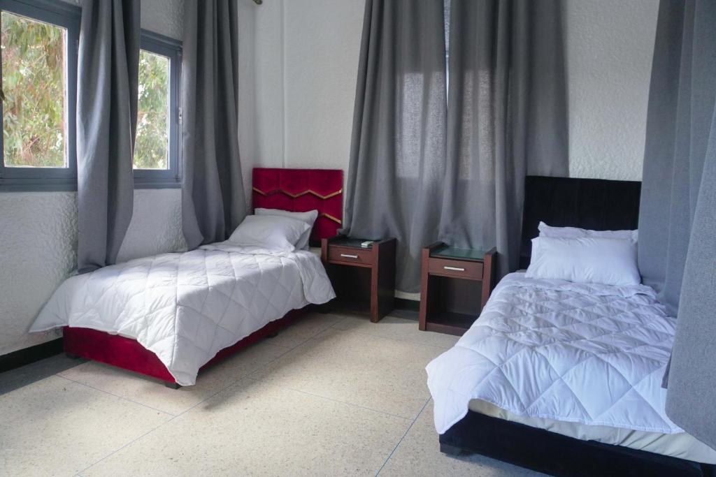 Postel nebo postele na pokoji v ubytování Hotel Warda