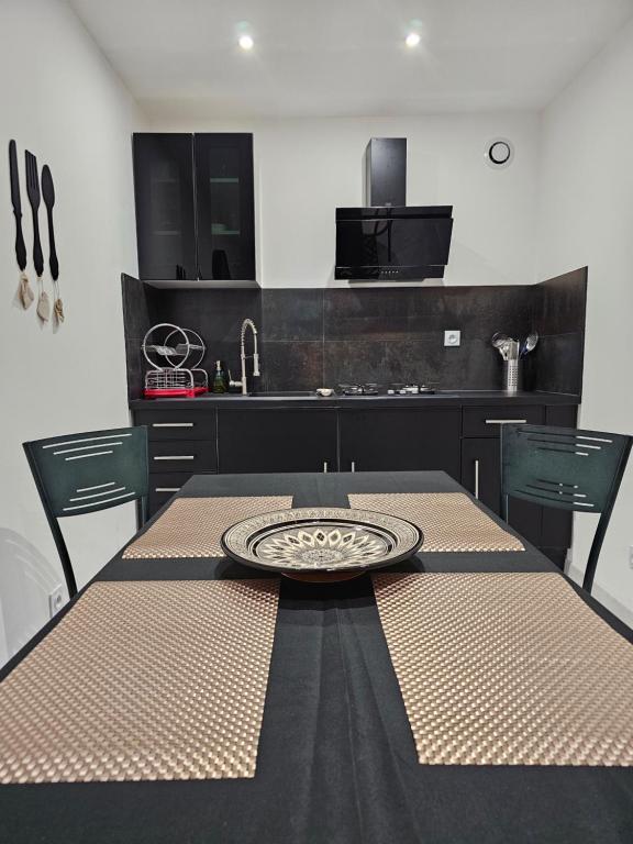 Kuchyň nebo kuchyňský kout v ubytování Appartement T2 bis à morbier