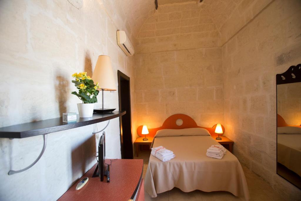 Letto o letti in una camera di Villa De Pietro