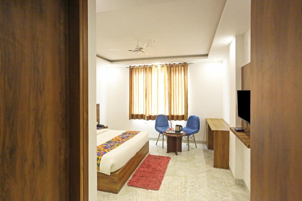 Postel nebo postele na pokoji v ubytování Hotel De Clark Residency Delhi Airport