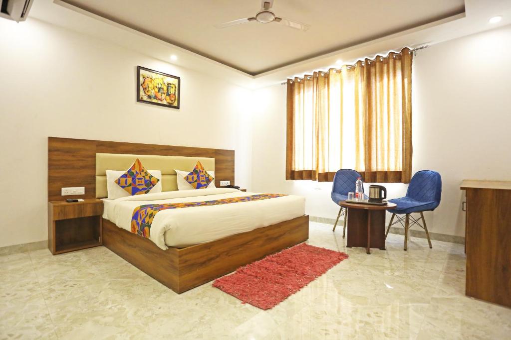 Postel nebo postele na pokoji v ubytování Hotel De Clark Residency Delhi Airport