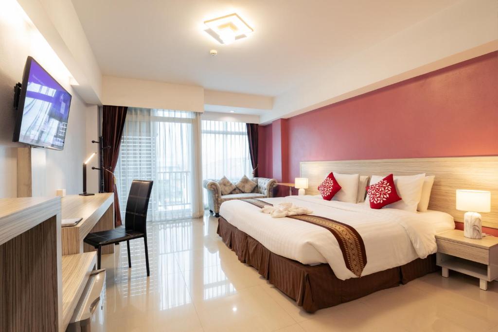 Postel nebo postele na pokoji v ubytování Tubtim Siam Suvarnabhumi Hotel