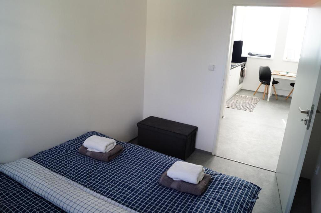 Postel nebo postele na pokoji v ubytování Apartmány Atrium