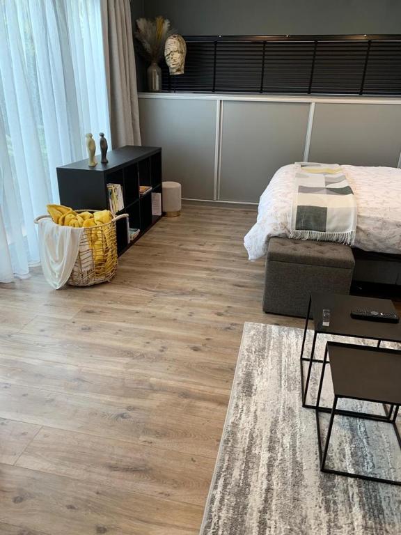 Postel nebo postele na pokoji v ubytování Guestsuite The Nest