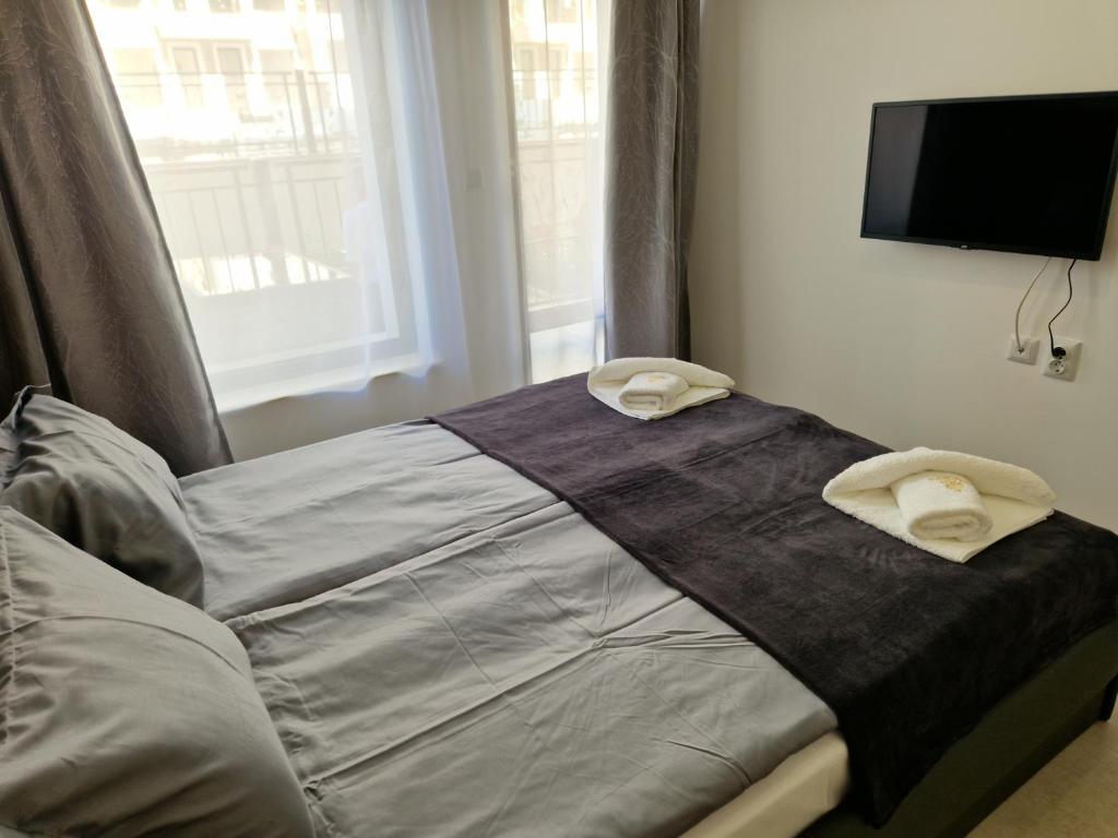 Postel nebo postele na pokoji v ubytování Polarstar 2-Zimmer Appartements