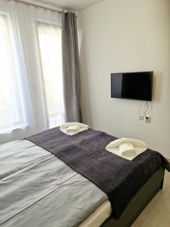 Postel nebo postele na pokoji v ubytování Polarstar 2-Zimmer Appartements