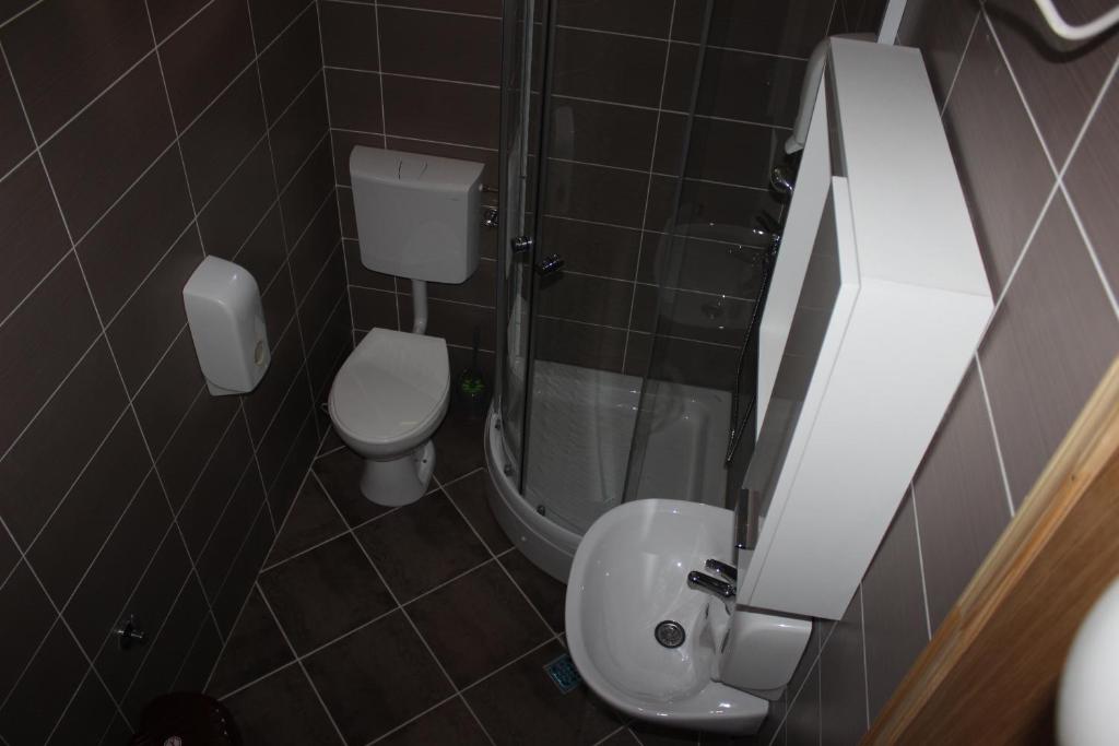 Koupelna v ubytování Rooms Zebax