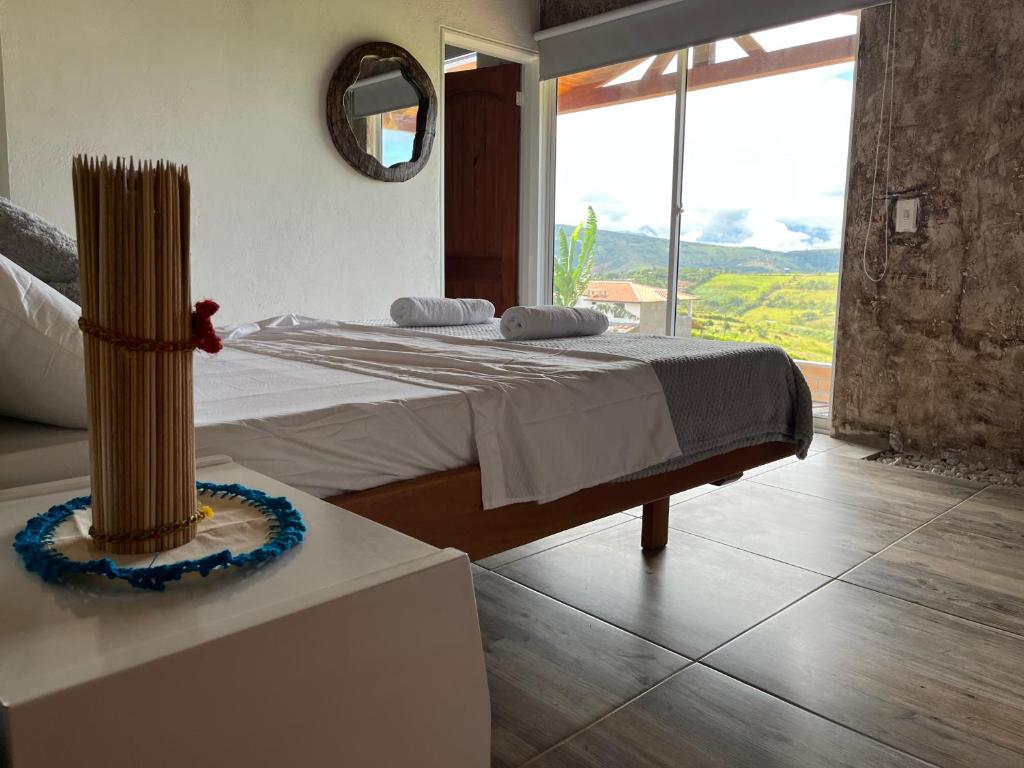 Postel nebo postele na pokoji v ubytování Cabaña Villa Lucia