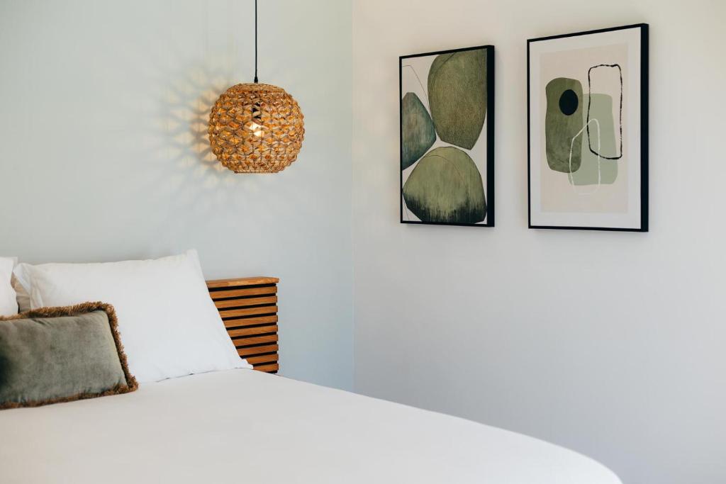 Postel nebo postele na pokoji v ubytování Pietermaai Oasis