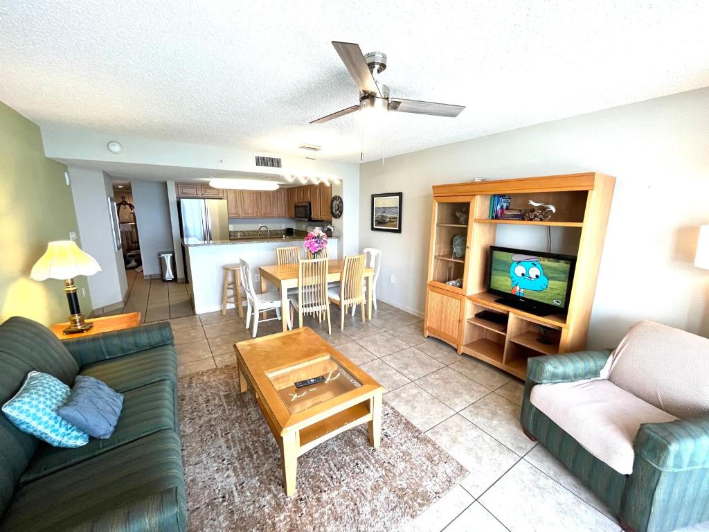 a living room with a couch and a table at Atlantica Resort in Myrtle Beach