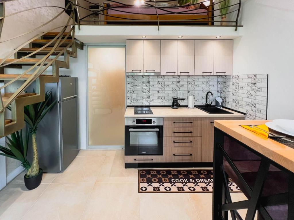 Kuchyň nebo kuchyňský kout v ubytování Fantasy Apartment