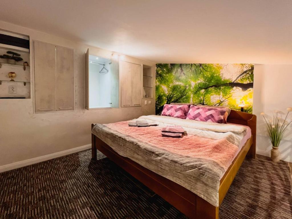 Postel nebo postele na pokoji v ubytování Fantasy Apartment