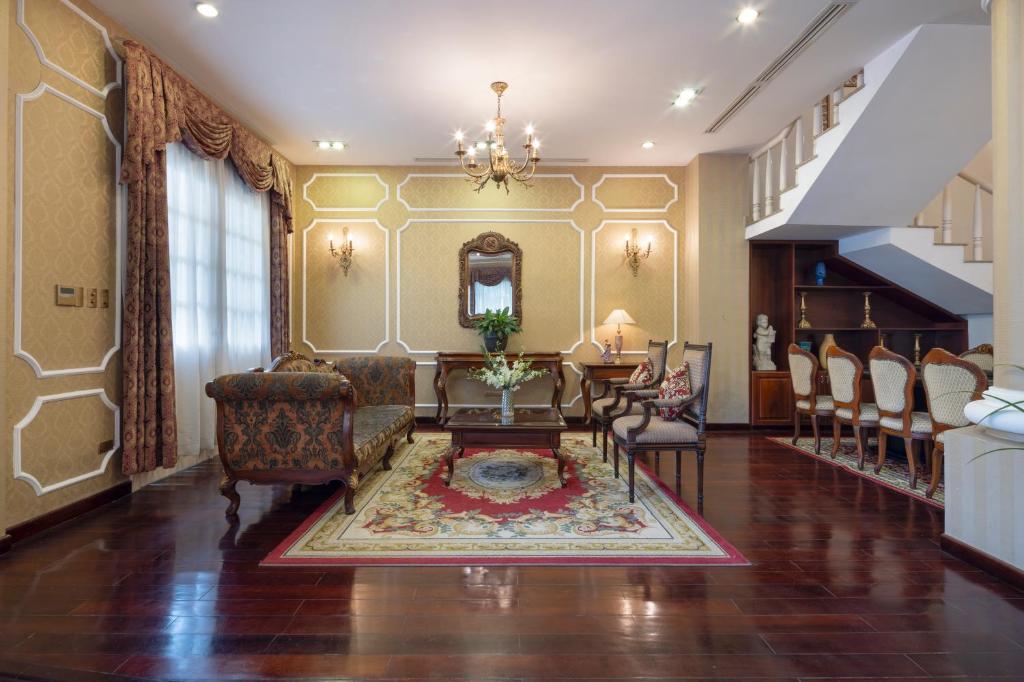 Posezení v ubytování Hidden Mansions Saigon Resort