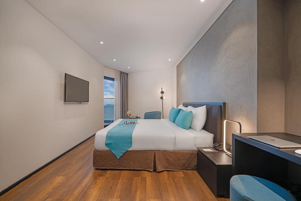Postel nebo postele na pokoji v ubytování The Code Hotel & Spa Da Nang