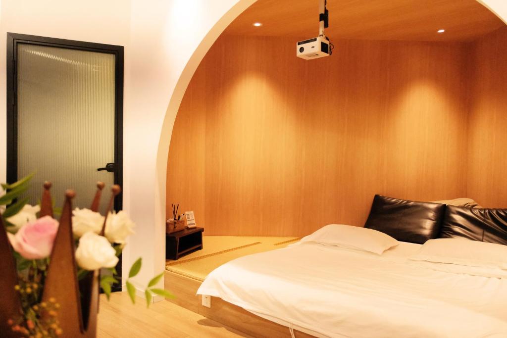 Postel nebo postele na pokoji v ubytování City Park Hotel