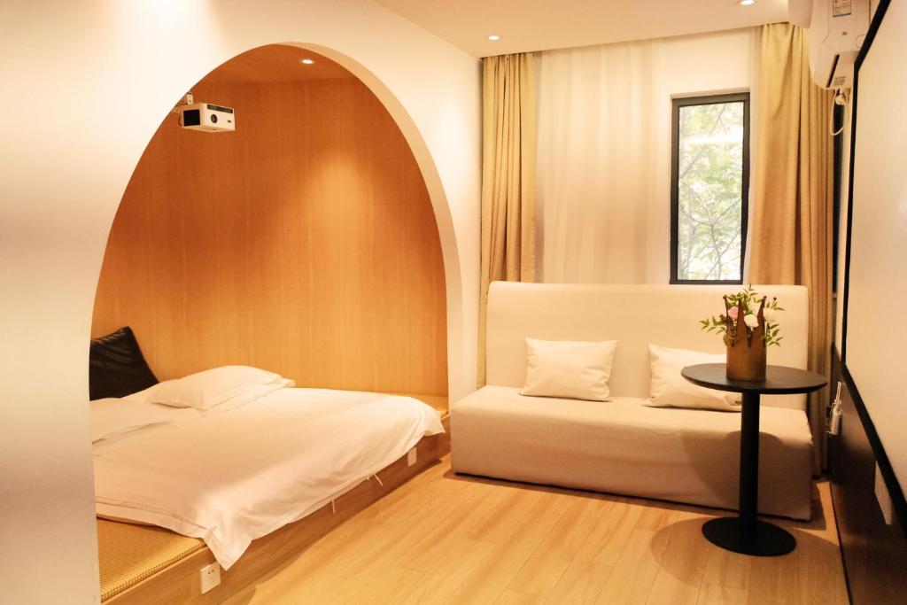 Postel nebo postele na pokoji v ubytování City Park Hotel