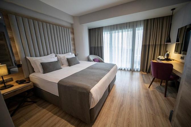 Postel nebo postele na pokoji v ubytování Seven For Life Thermal Hotel