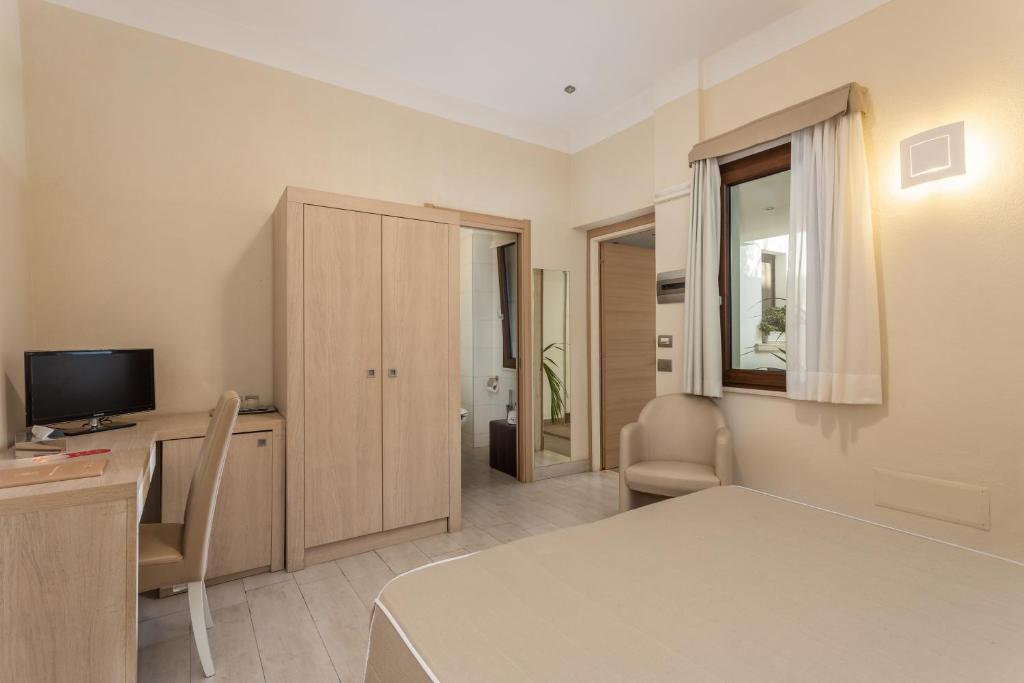 TV a/nebo společenská místnost v ubytování Hotel Belvir