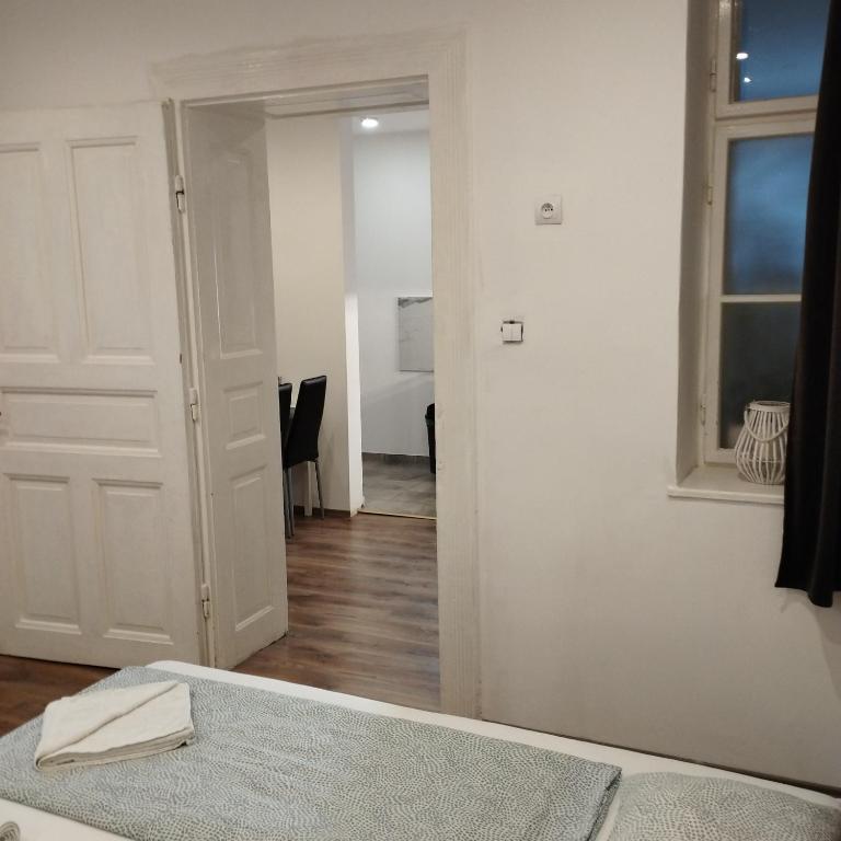 Postel nebo postele na pokoji v ubytování Apartmány 77