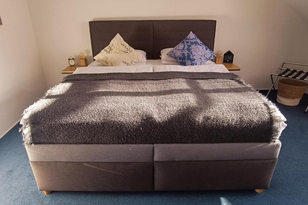 Postel nebo postele na pokoji v ubytování Hotel Baroko