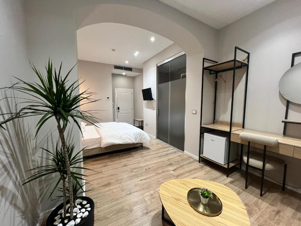 Postel nebo postele na pokoji v ubytování Enzo rooms & apartment Blloku