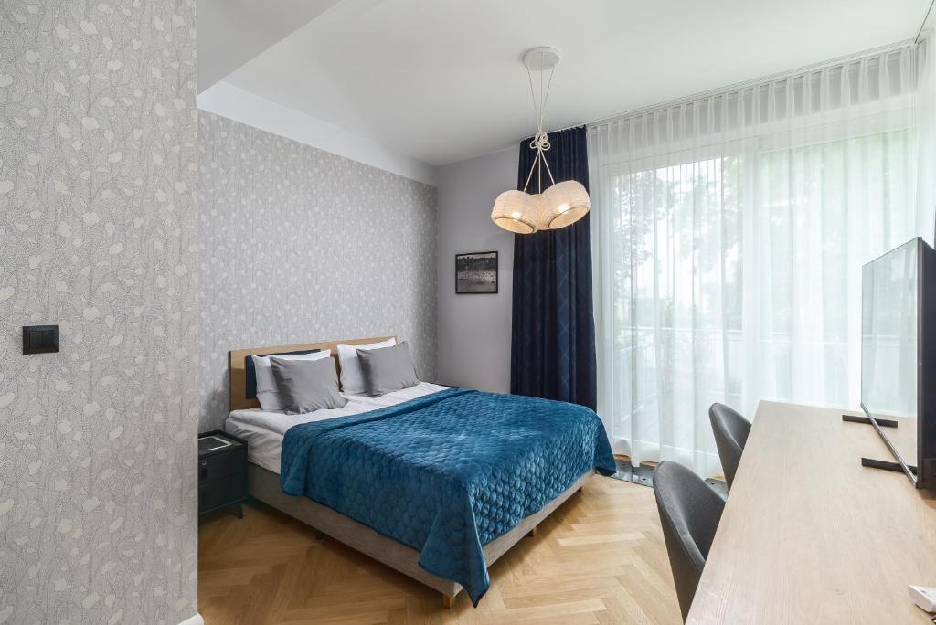 Postel nebo postele na pokoji v ubytování Grand Tulipan