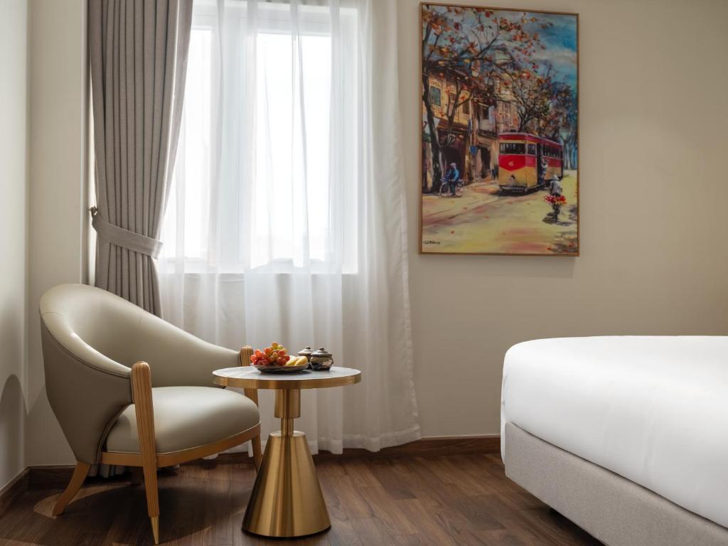 Postel nebo postele na pokoji v ubytování L'Signature Hotel & Spa
