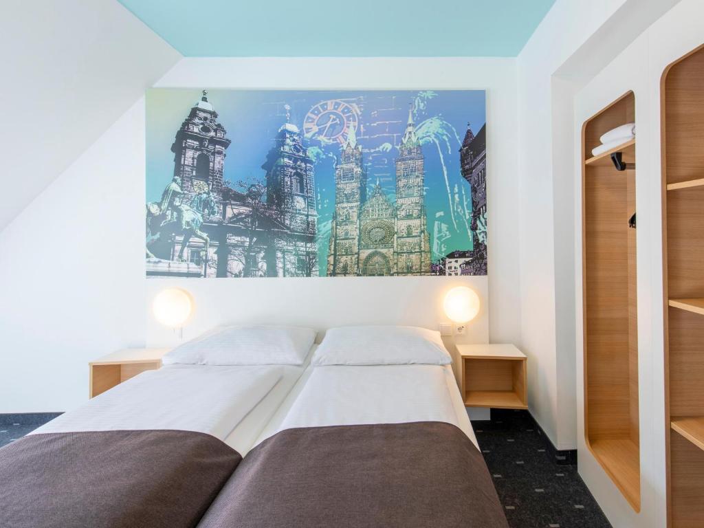 Postel nebo postele na pokoji v ubytování B&B Hotel Nürnberg-City