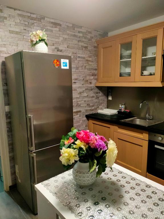 Kuchyňa alebo kuchynka v ubytovaní Place privée/Le Marbré/Moderne/60m2