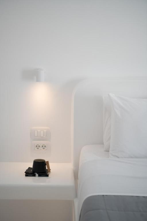 Postel nebo postele na pokoji v ubytování White Concept Caves