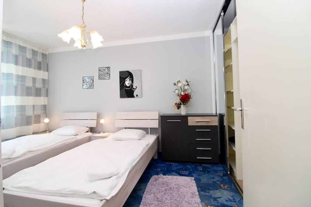 Posteľ alebo postele v izbe v ubytovaní Cozy Apartment FREE parking