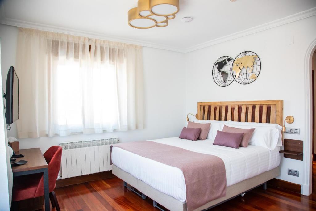 Postel nebo postele na pokoji v ubytování Hotel Spa Viña Real