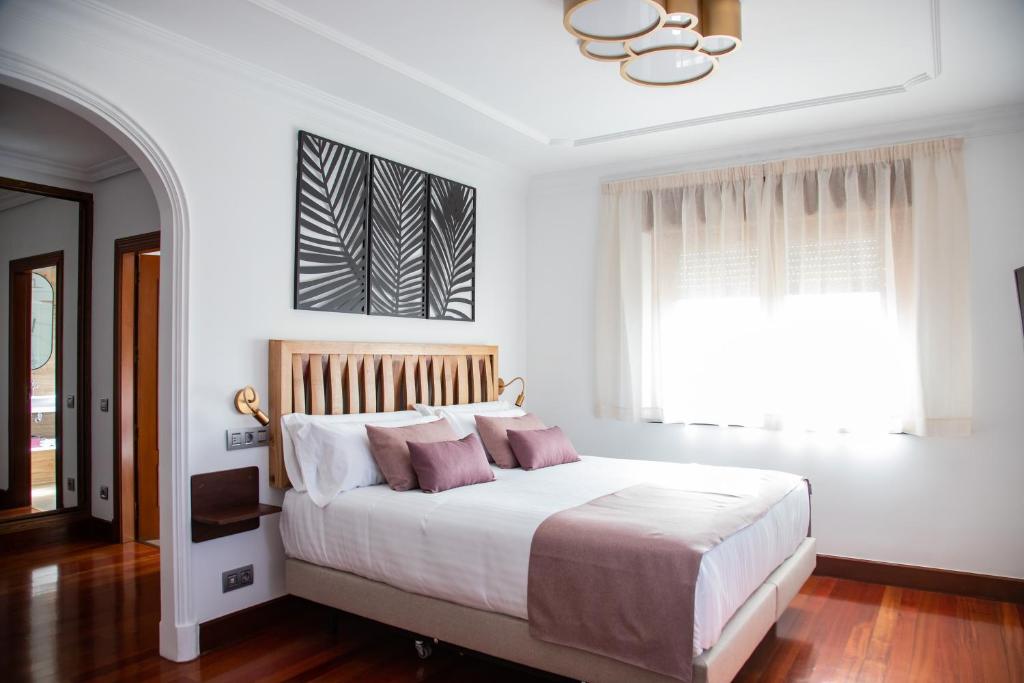 Postel nebo postele na pokoji v ubytování Hotel Spa Viña Real