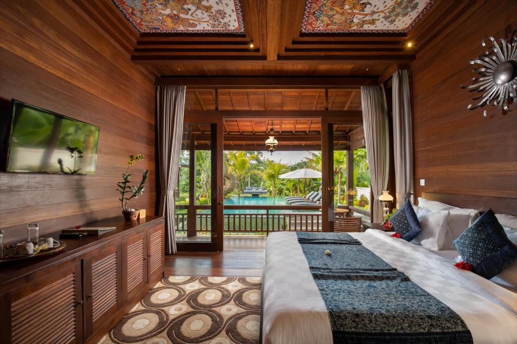 Postel nebo postele na pokoji v ubytování Abian Taksu Suite & Villas
