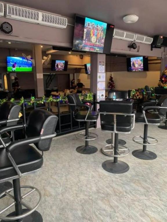 TV a/nebo společenská místnost v ubytování The Sports Lounge