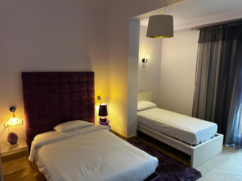 Postel nebo postele na pokoji v ubytování Casa Del Sol