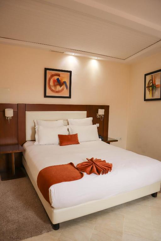 Postel nebo postele na pokoji v ubytování Appart-hotel Marrakech Inn