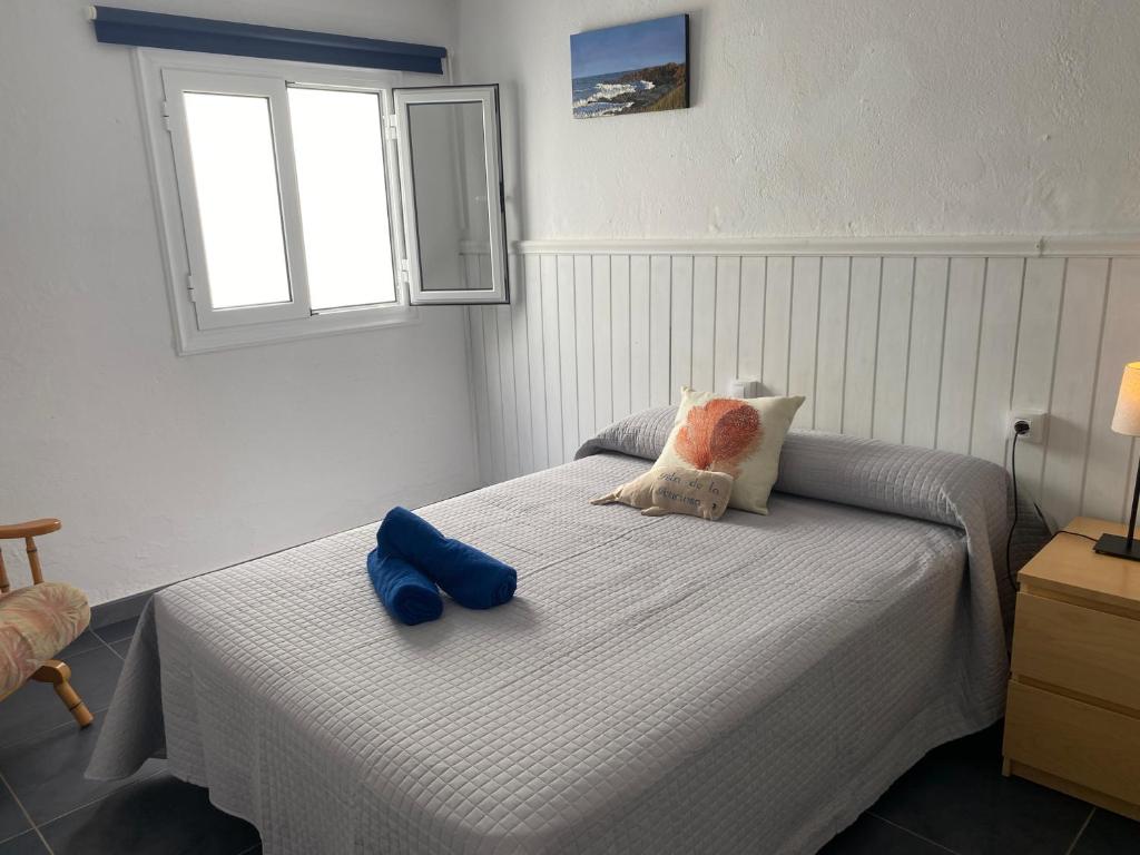 Postel nebo postele na pokoji v ubytování Mirador del muelle house