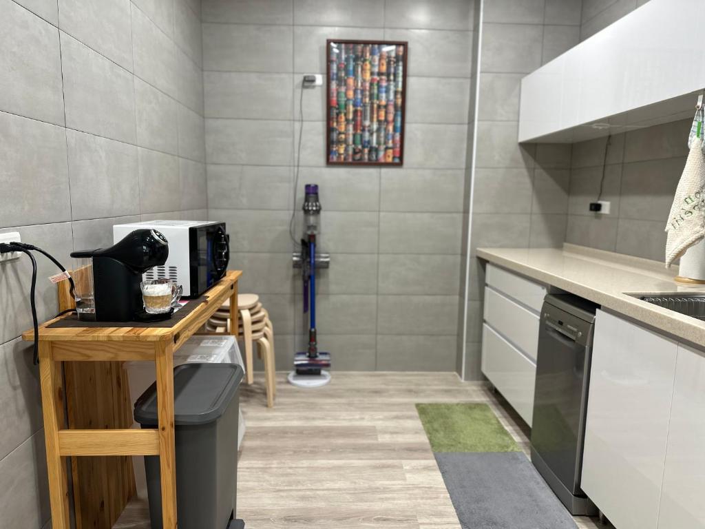 Kuchyň nebo kuchyňský kout v ubytování WinXin House